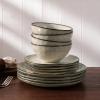 imageFamiware Dinnerware Sets for 4 Ocean Round 12Piece Kitchen Plates and Bowls Sets Microwave and Dishwasher Safe Scratch Resistant Matte BlackLight khaki