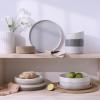 imageFamiware Nebula Plates and Bowls Sets for 4 12 Pieces Stoneware Dinnerware Set Microwave and Dishwasher Safe Dishes Set White with Black RimMulticolor