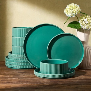 image:imageFamiware Star 12Piece Stoneware Dinnerware Set for 4  Oat Ceramic Ribbed Plates and Bowls  Modern Rustic Dishes Everyday amp Formal Use  Chip amp Scratch Resistant Microwave amp Dishwasher SafeSage Green
