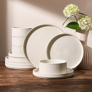 image:imageFamiware Star 12Piece Stoneware Dinnerware Set for 4  Oat Ceramic Ribbed Plates and Bowls  Modern Rustic Dishes Everyday amp Formal Use  Chip amp Scratch Resistant Microwave amp Dishwasher SafeOat