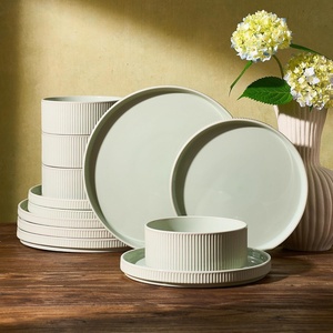 image:imageFamiware Star 12Piece Stoneware Dinnerware Set for 4  Oat Ceramic Ribbed Plates and Bowls  Modern Rustic Dishes Everyday amp Formal Use  Chip amp Scratch Resistant Microwave amp Dishwasher SafeLight Green